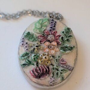 Handmade clay and resin silver-plated pendant. Unique, art jewelry.